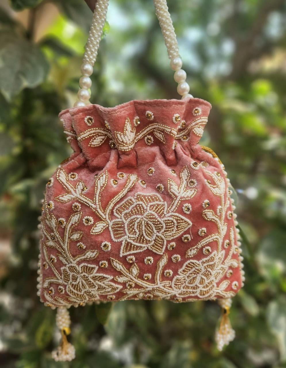 Hand embroidered pearl work potli bag