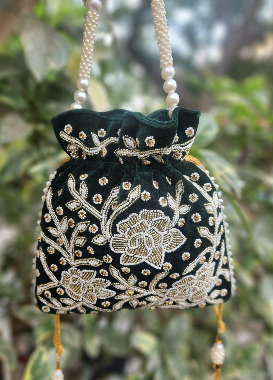 Hand embroidered pearl work potli bag