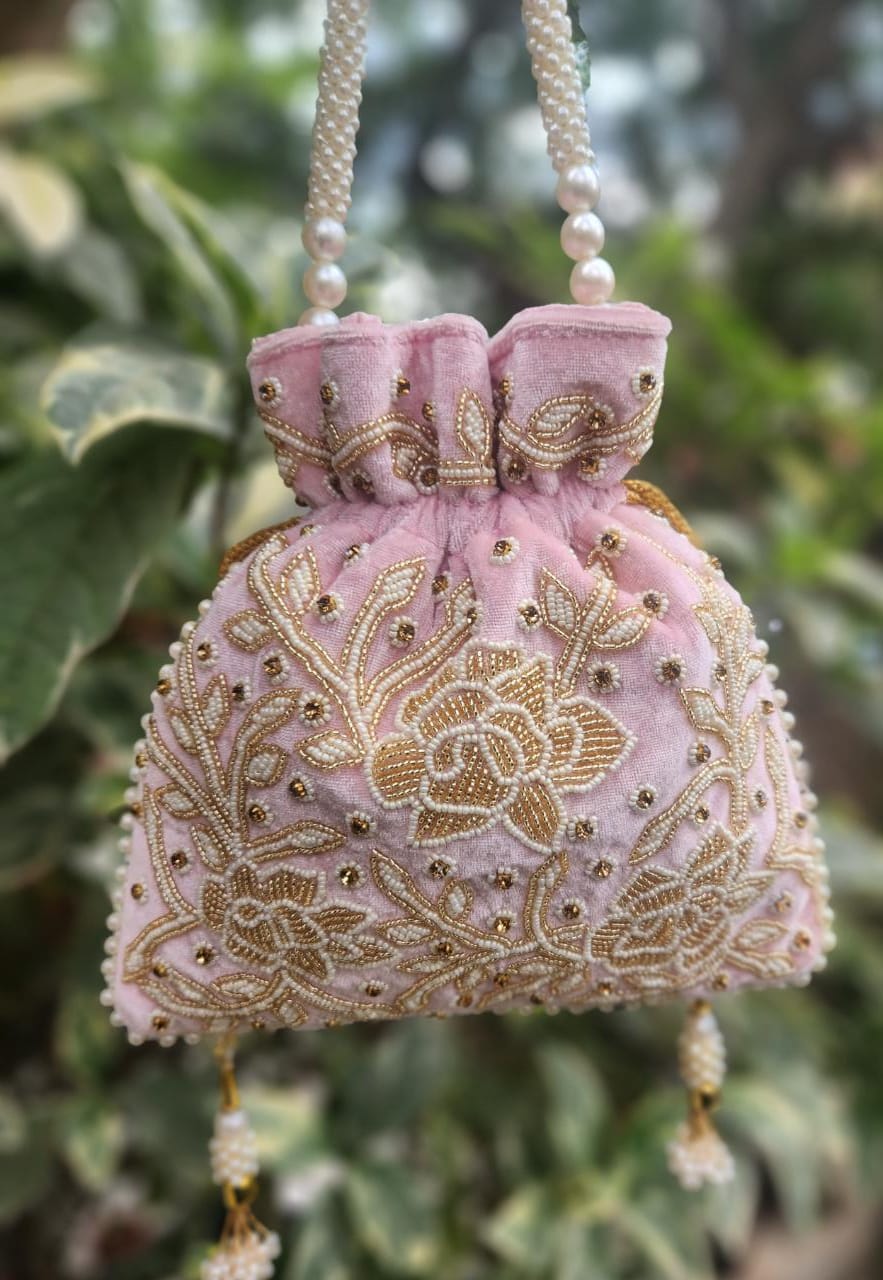Hand embroidered pearl work potli bag