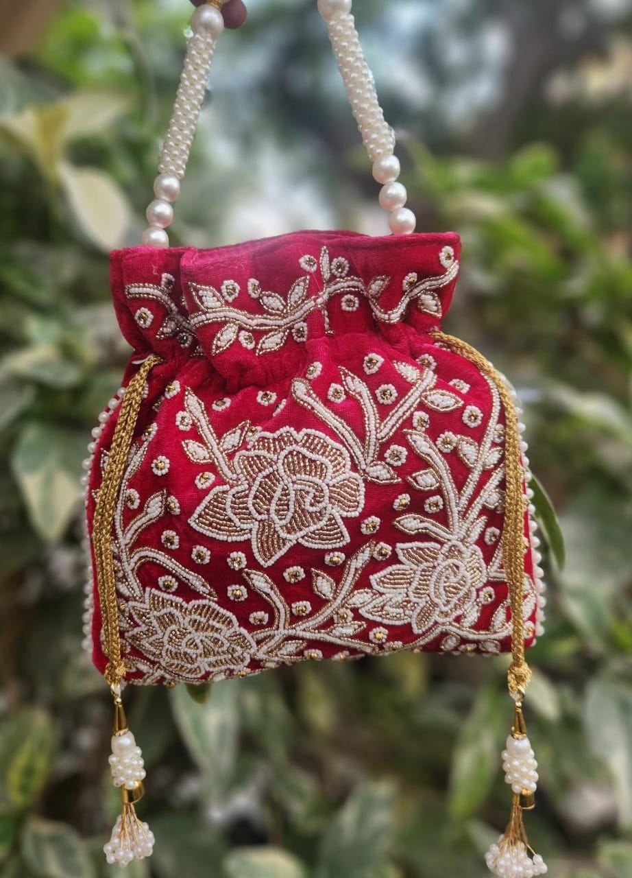Hand embroidered pearl work potli bag