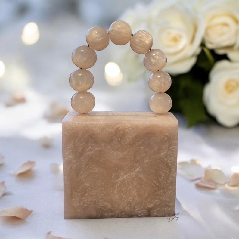 MINI off white  resin clutch with pearl handle