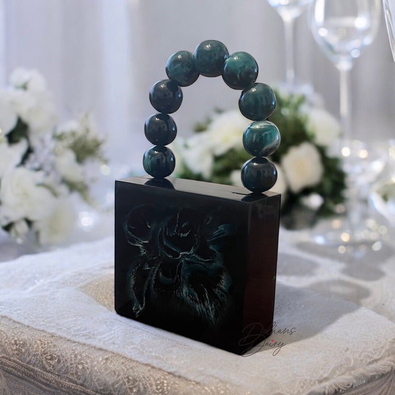 Emerald MINI resin clutch with big pearl handle
