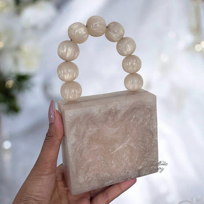 MINI off white  resin clutch with pearl handle