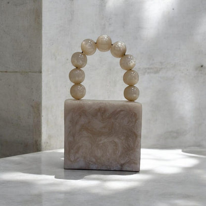 MINI off white  resin clutch with pearl handle