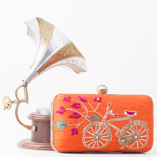 CYCLE embroidery raw silk clutch