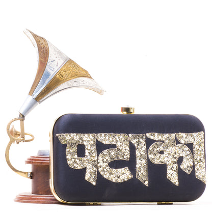 PATAKA sequins work on raw silk clutch