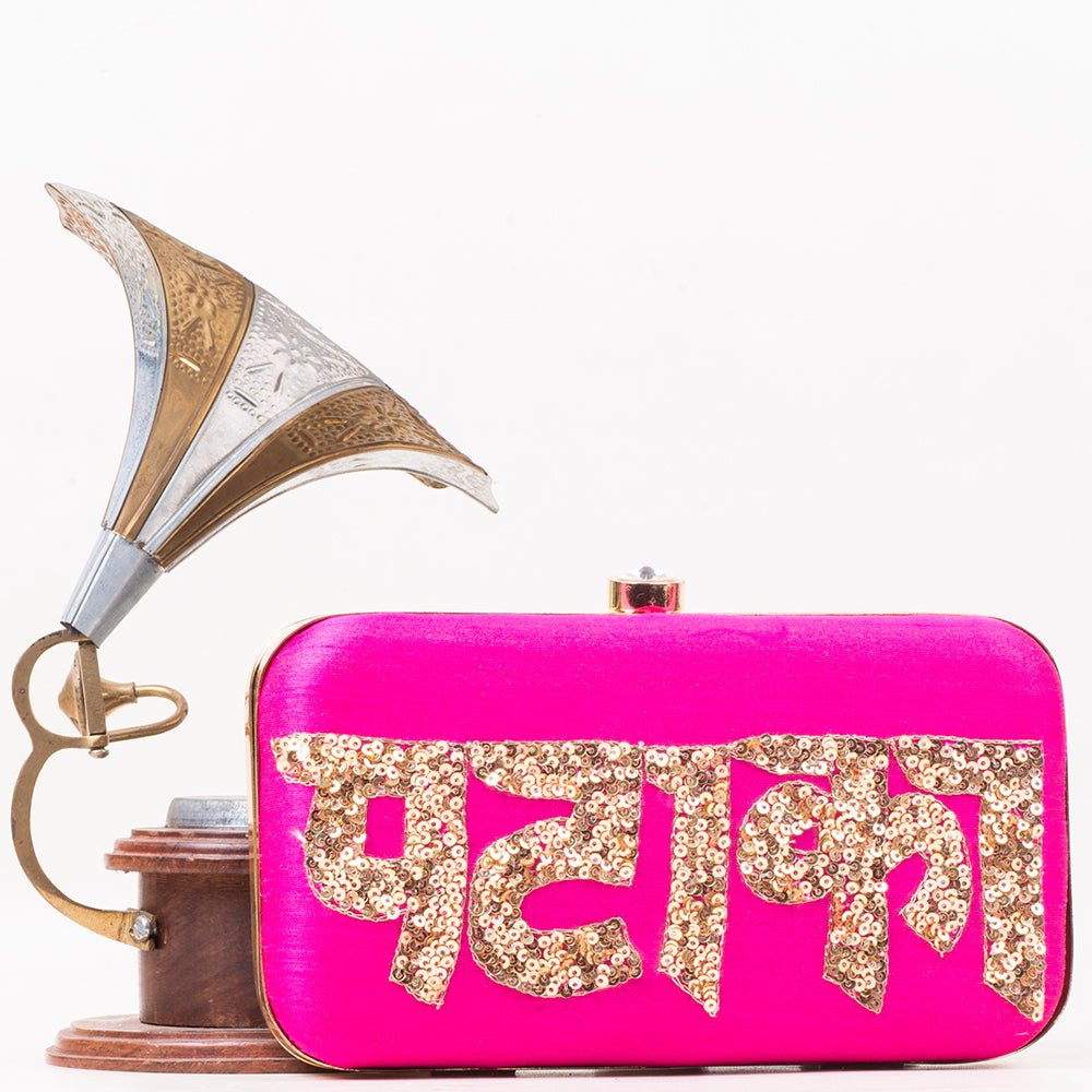 PATAKA sequins work on raw silk clutch