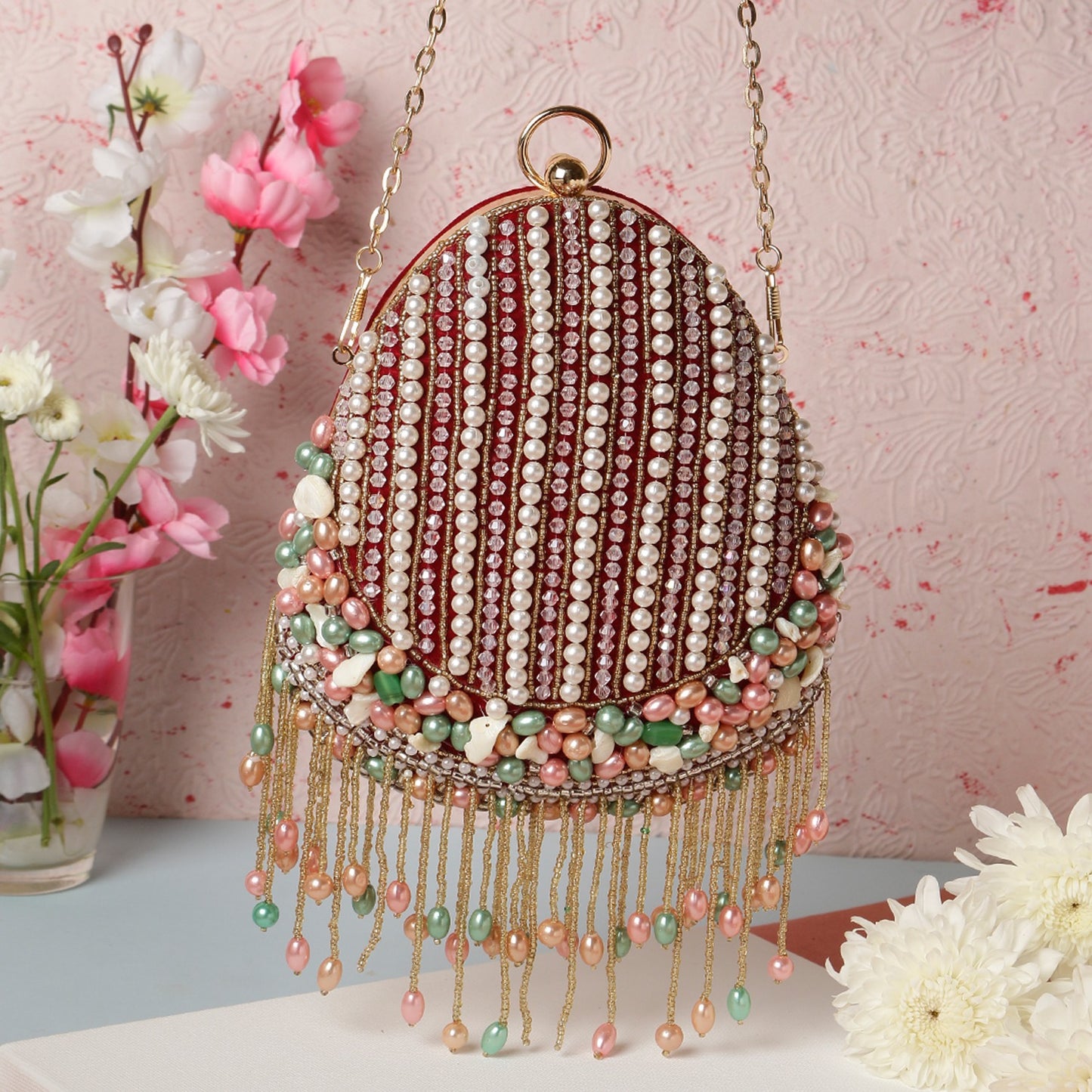 Heavy Designer Almond Shape Maroon Clutch with tassels