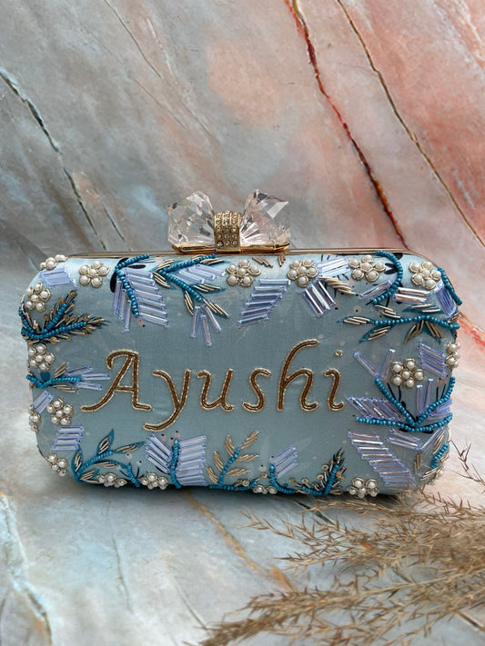 Designer sky blue printed embroidery customised clutch with crystal knob