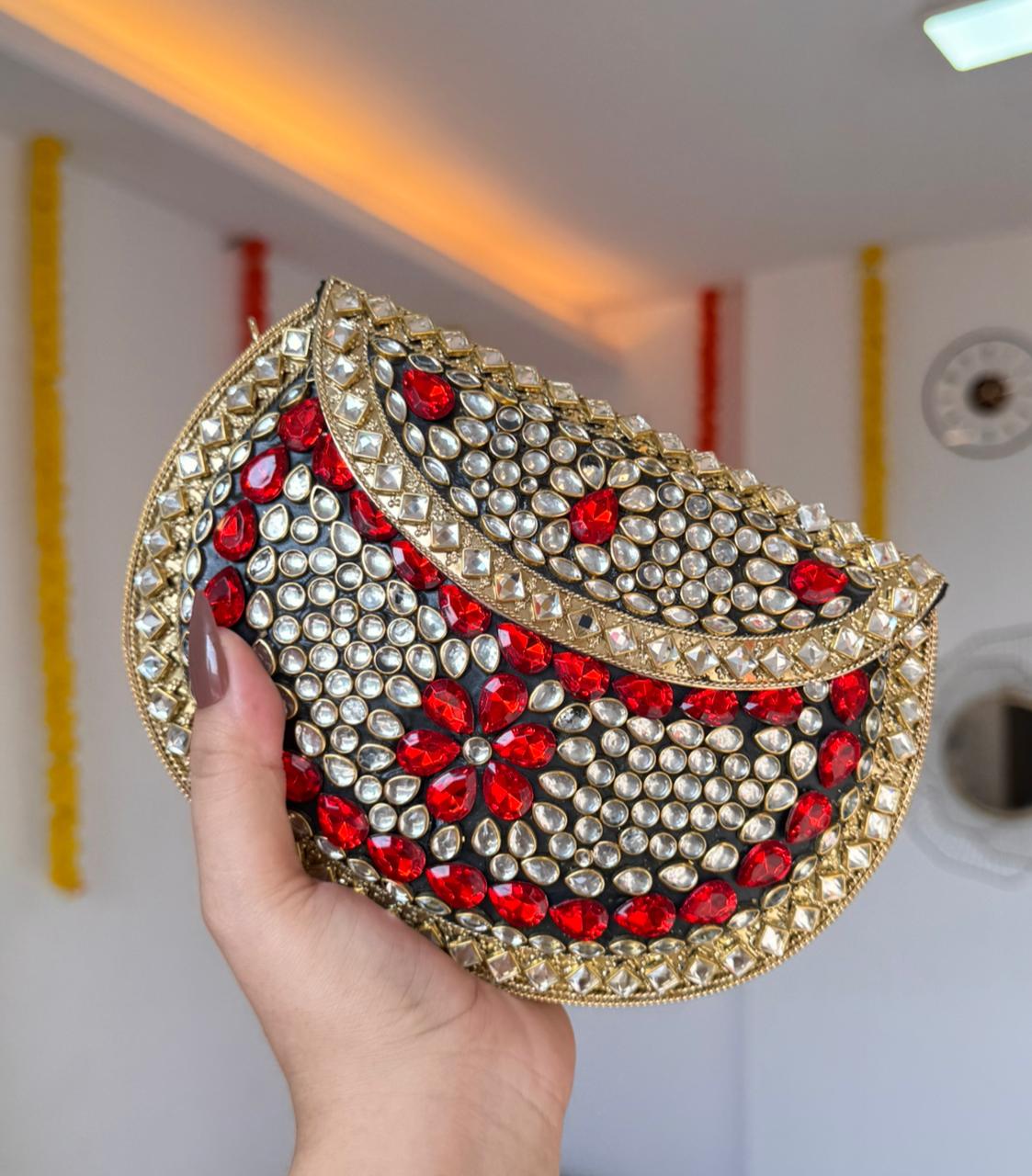 RAJSI rhinestone kundan work brass clutch