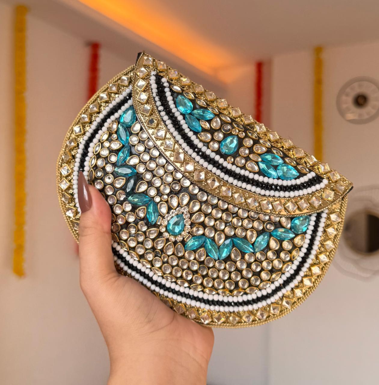 RAJSI rhinestone kundan work brass clutch