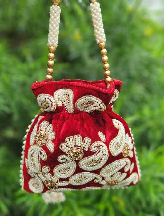 Hand embroidered pearl work potli bag - Red