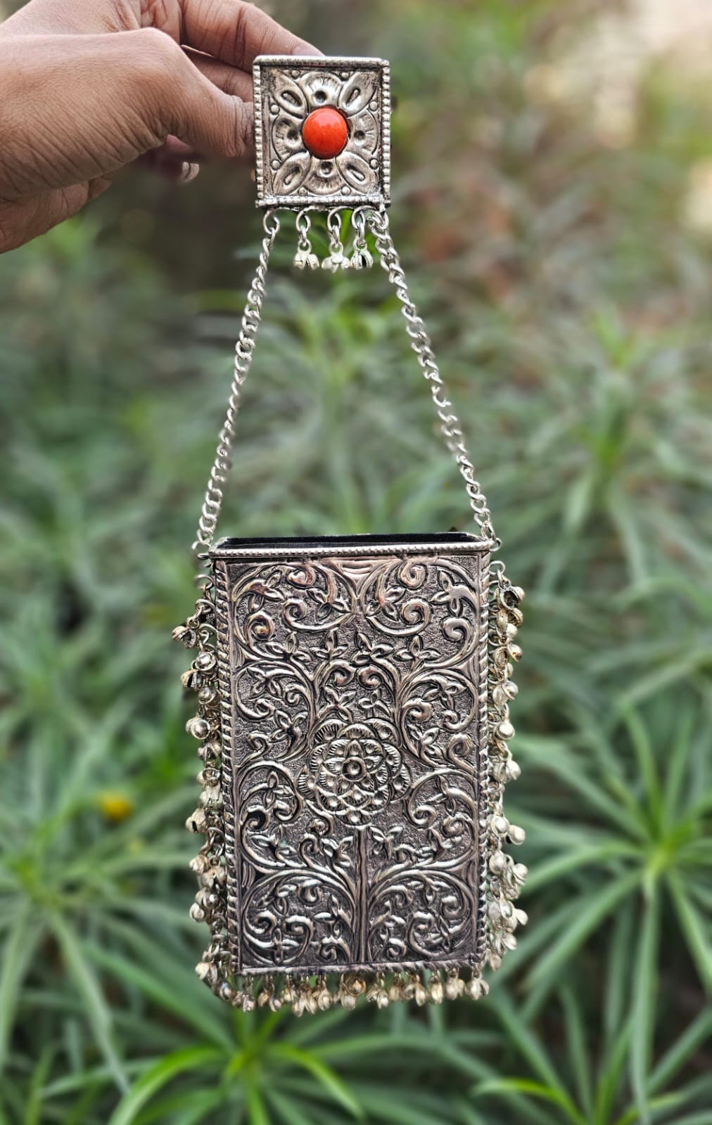 Mobile brass clutch with saree hook