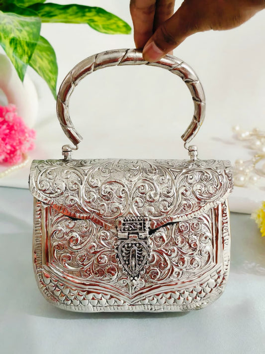Silver brass clutch bag