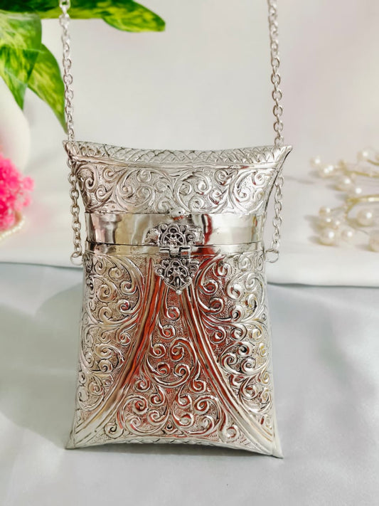 Silver brass clutch bag