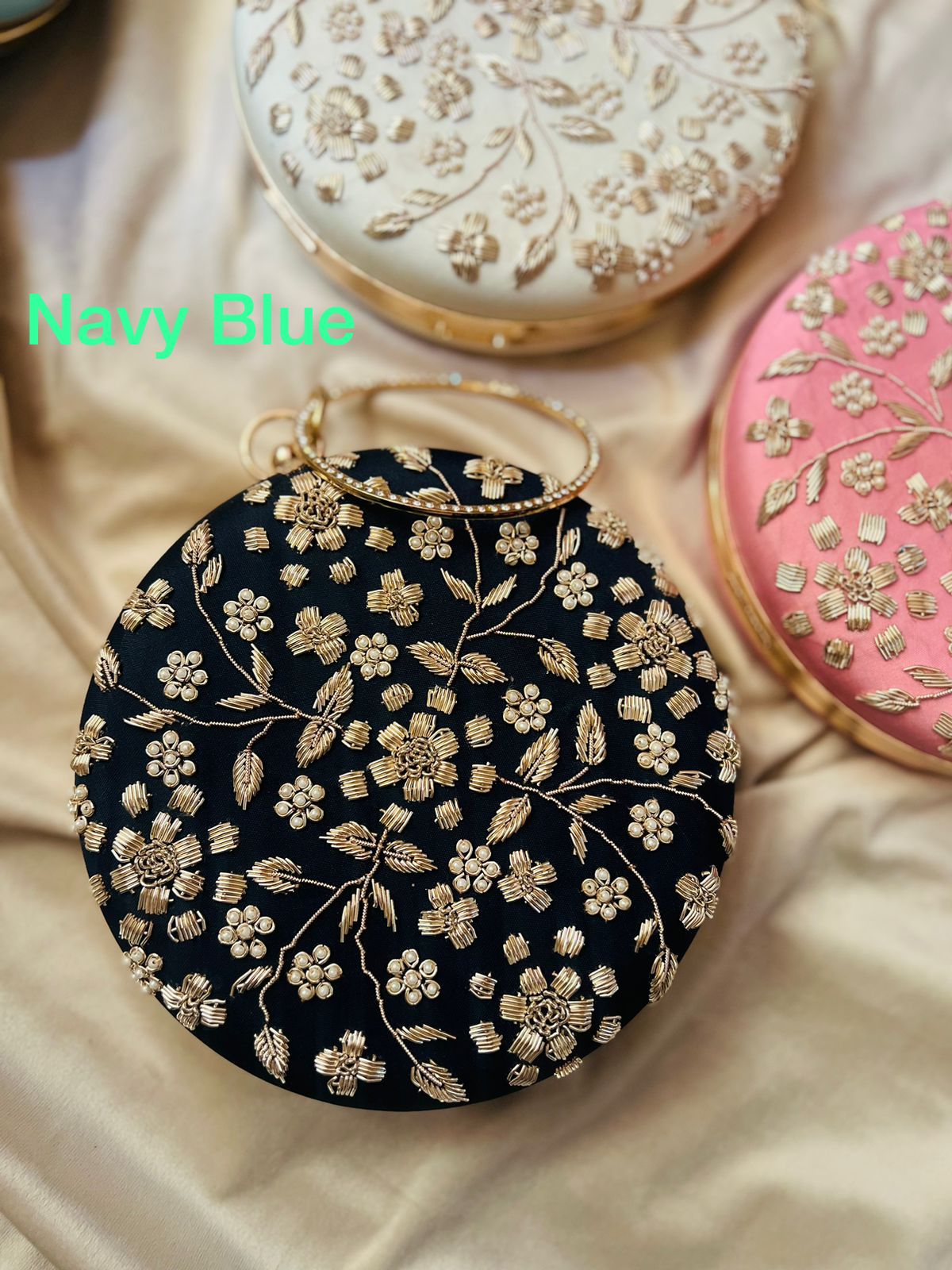 PREMIUM golden embroidery round clutch