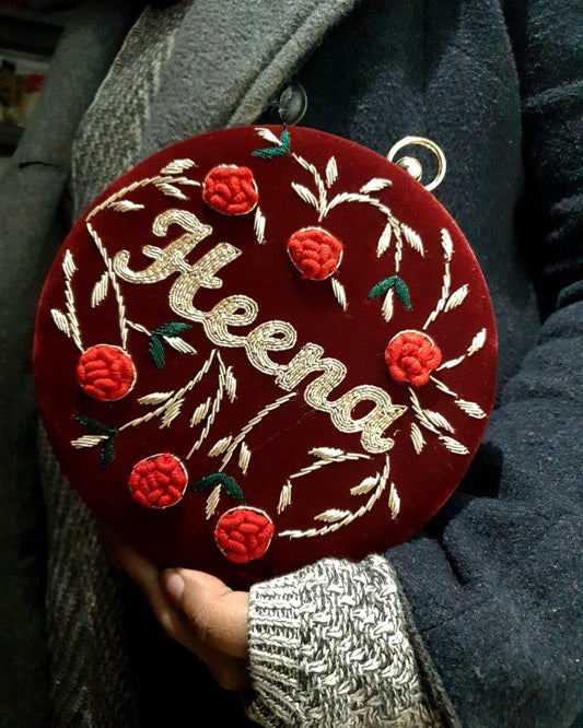 Round embroidered clutch with flower & golden work