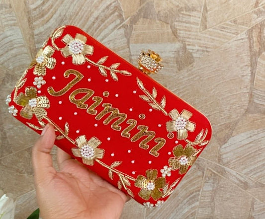 Custom name clutch with golden floral embroidery