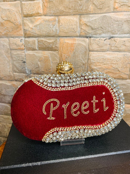 Maroon oval name clutch with stone work