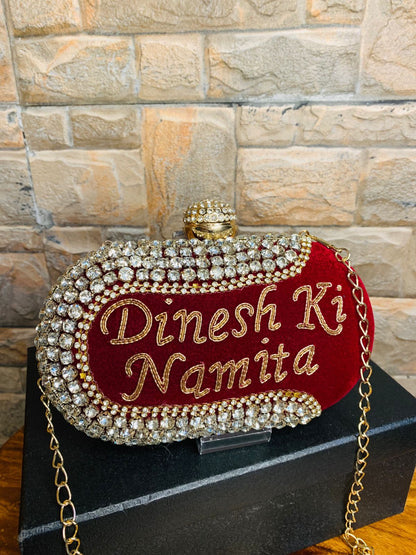 Maroon oval name clutch with stone work