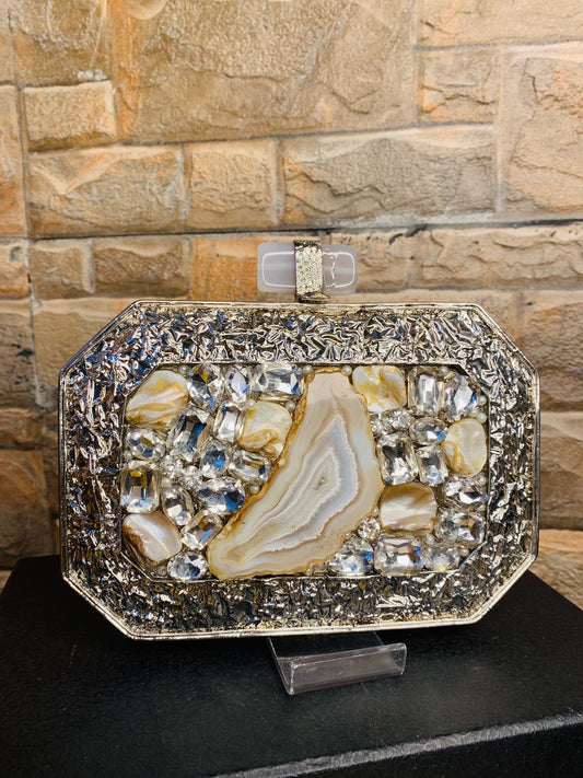 PREMIUM silver mother of pearl oval clutch with stone work