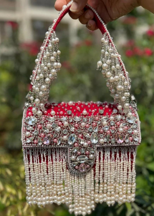 Celebrity edition mesmerizing flap clutch with matching handle