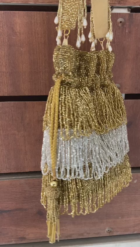 Golden & silver Cut Dana potli bag