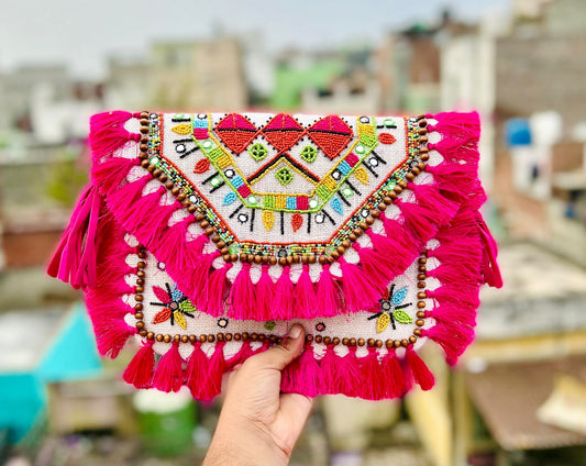 Handmade banjara bag with pink tassels and bead work