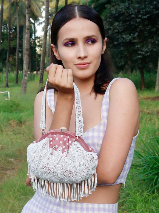 Baby Pink half frame white pearl potli bag