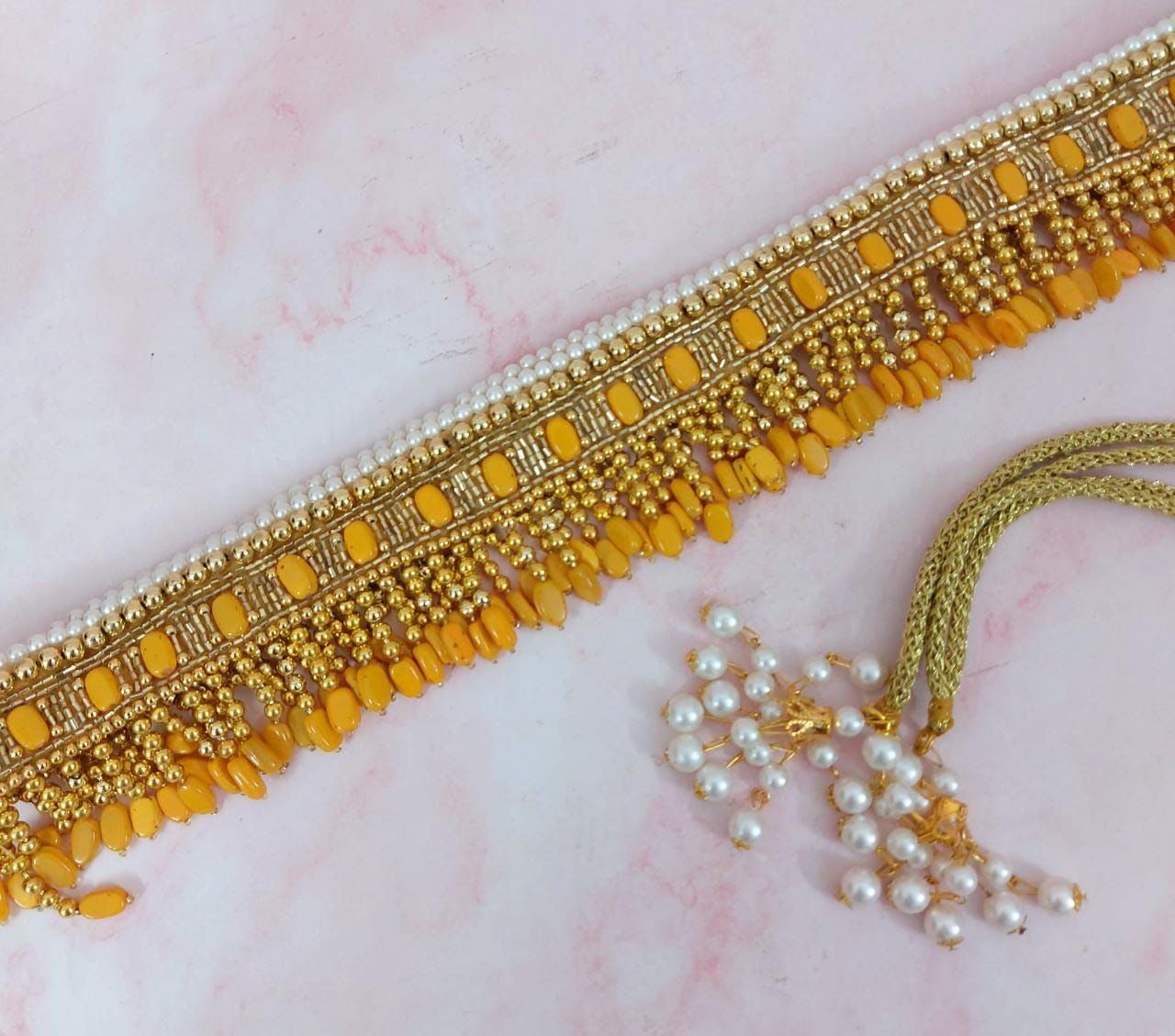 Yellow waistbelt with golden bead work