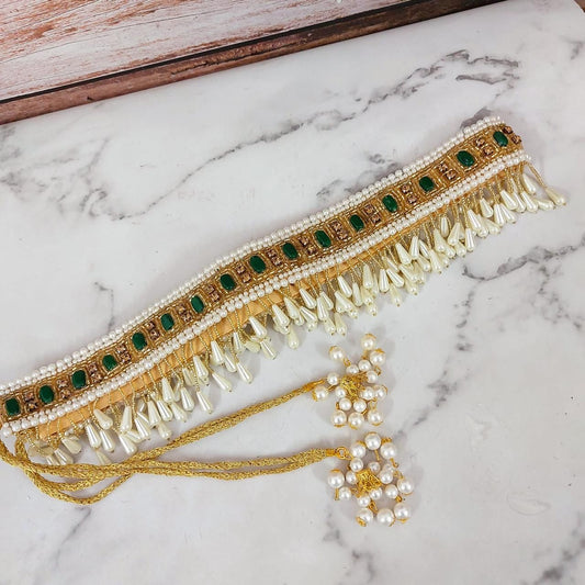 Golden waistbelt with emerald green bead work and pearl drop tassel