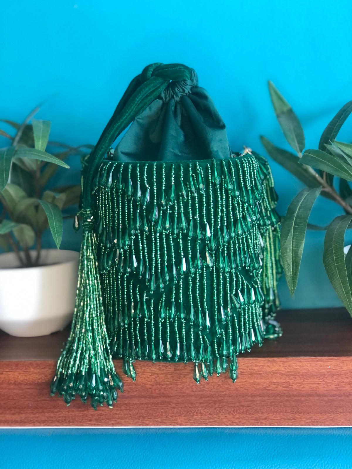 Celebrity style EMERALD drawstring potli bucket bag with karadana pearl drops - EXCLUSIVE COLLECTION