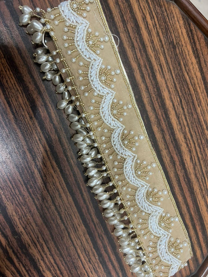 Fabric waistbelt with piping and pearl work