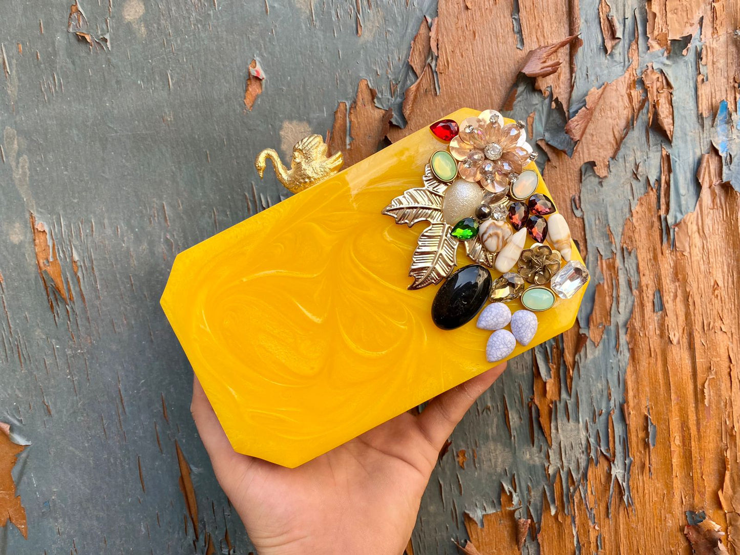 Resin clutch with designer knob and stone work - Yellow