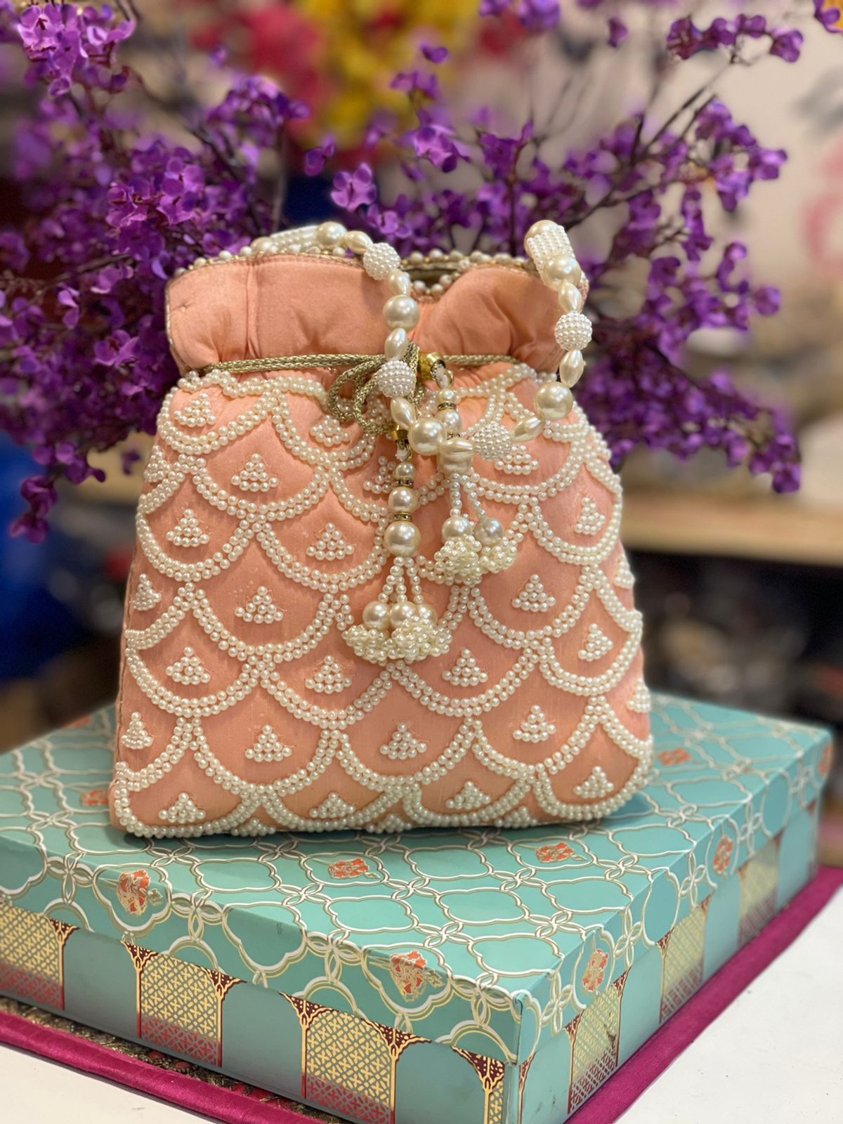 Maroon Printed Saree Set With Potli Bag Design by DiyaRajvvir at Pernia's  Pop Up Shop 2023