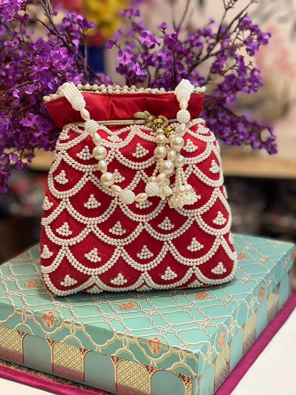 Pearl work potli bag with latkan