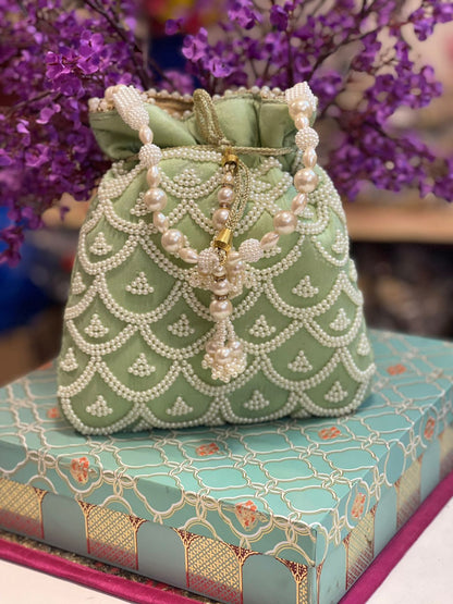 Pearl work potli bag with latkan