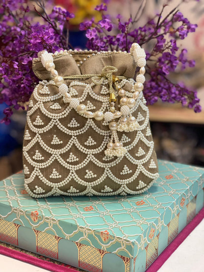 Pearl work potli bag with latkan