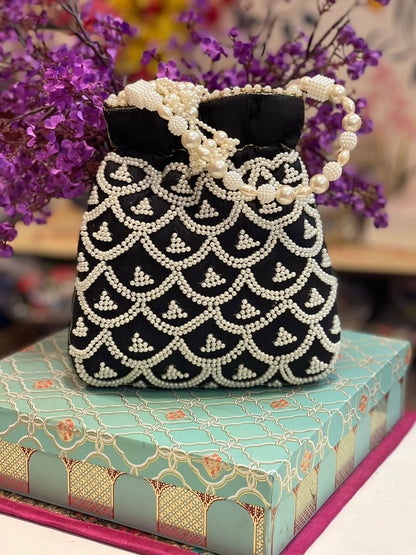 Pearl work potli bag with latkan