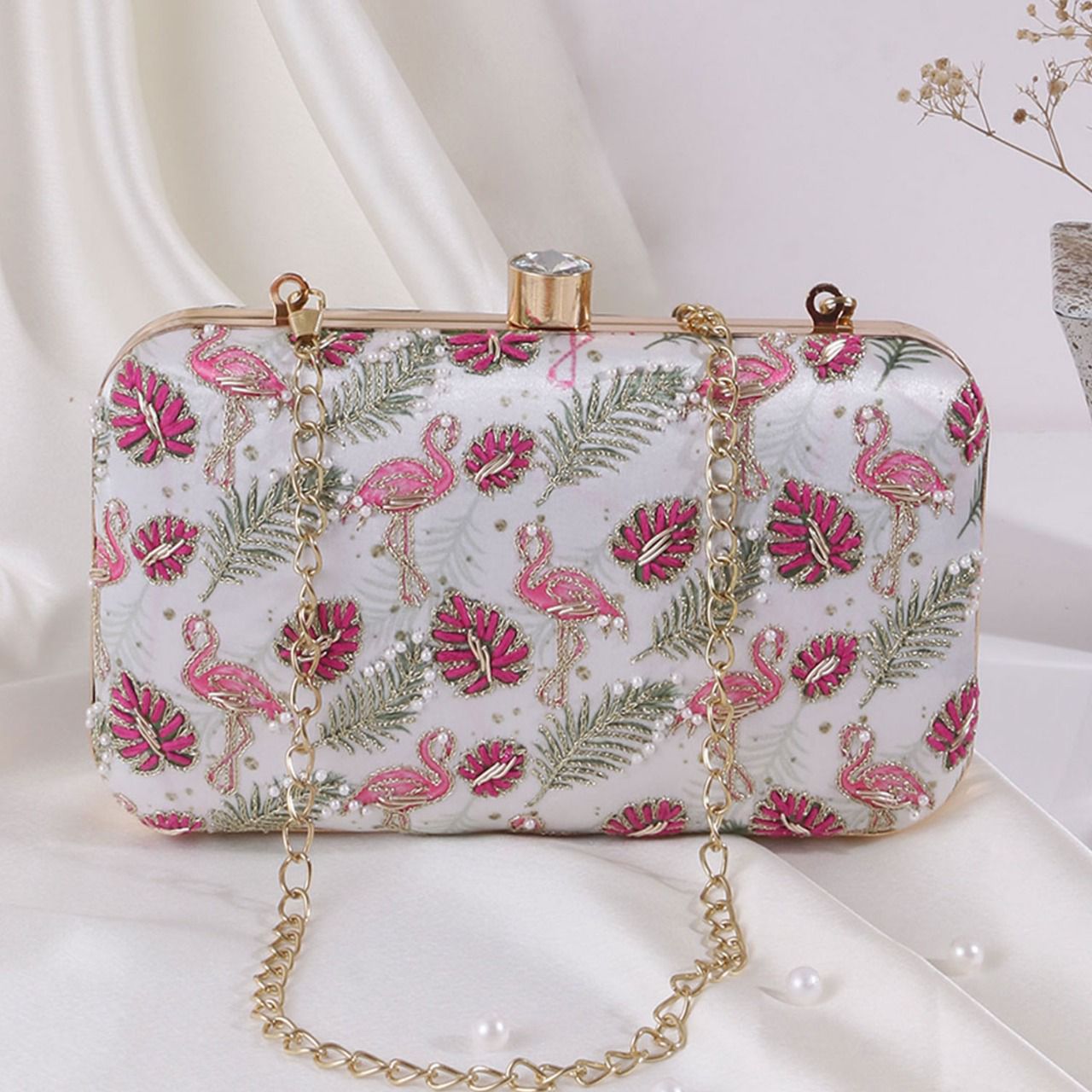 White printed clutch with pink flamingo embroidery work