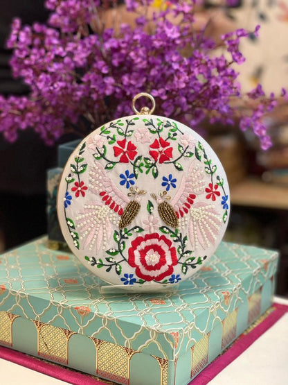 Round embroidered clutch with bead work