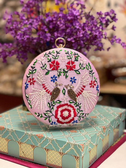 Round embroidered clutch with bead work