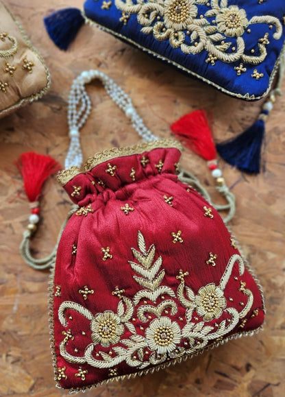 Zardosi work potli with pearl handle