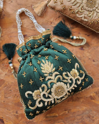 Zardosi work potli with pearl handle