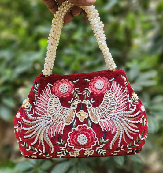 Bird embroidery handwork potli with pearl handle