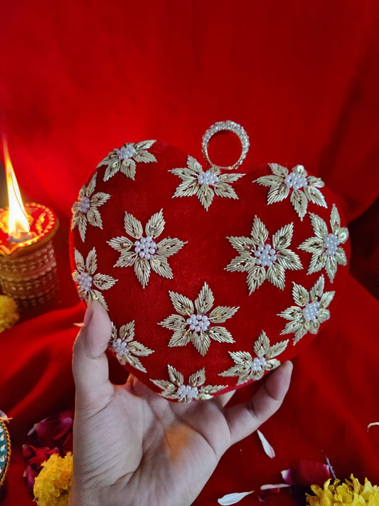 Red heart shape clutch with embroidery