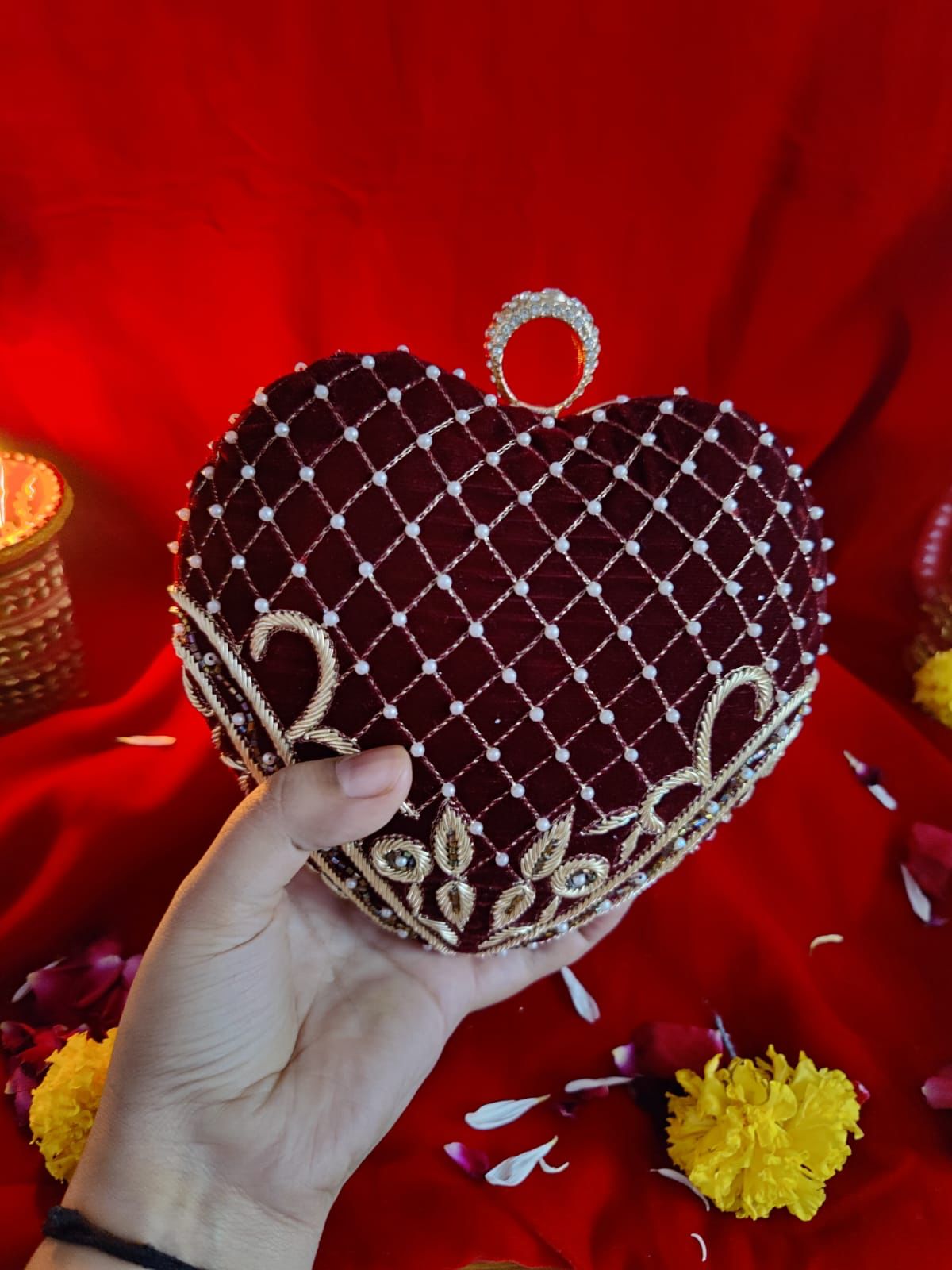 Maroon heart shape clutch with embroidery