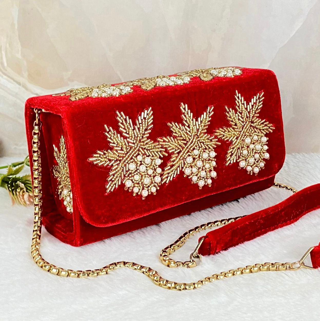 Box flap bag with golden embroidery and bead work