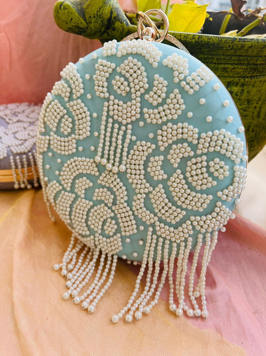 Round clutch with pearl work and latkans