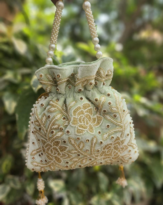Hand embroidered pearl work potli bag
